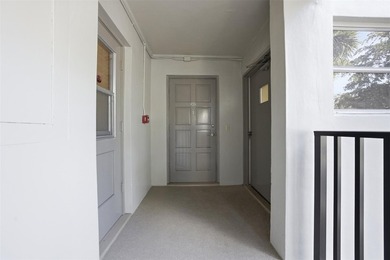 Welcome to this bright and spacious second-floor 3-bedroom on Palm-Aire Country Club and Resort - Palms in Florida - for sale on GolfHomes.com, golf home, golf lot