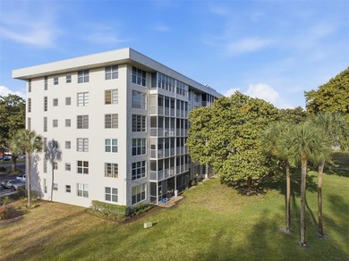 Welcome to this bright and spacious second-floor 3-bedroom on Palm-Aire Country Club and Resort - Palms in Florida - for sale on GolfHomes.com, golf home, golf lot