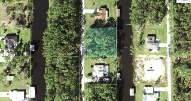Come build your forever home on this one-half acre CANAL lot on Indian Lake Estates Golf and Country Club in Florida - for sale on GolfHomes.com, golf home, golf lot