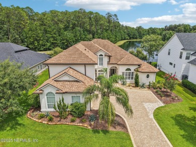Experience unmatched luxury in this breathtaking waterfront on Eagle Harbor Golf Club in Florida - for sale on GolfHomes.com, golf home, golf lot