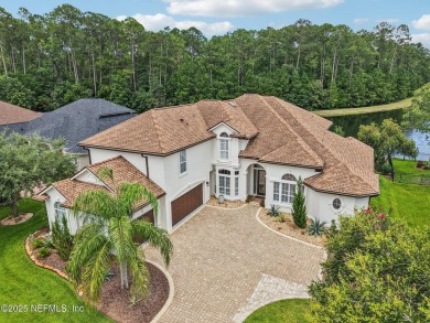 Experience unmatched luxury in this breathtaking waterfront on Eagle Harbor Golf Club in Florida - for sale on GolfHomes.com, golf home, golf lot