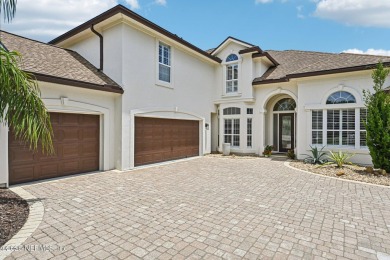 Experience unmatched luxury in this breathtaking waterfront on Eagle Harbor Golf Club in Florida - for sale on GolfHomes.com, golf home, golf lot