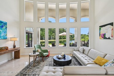 Experience unmatched luxury in this breathtaking waterfront on Eagle Harbor Golf Club in Florida - for sale on GolfHomes.com, golf home, golf lot