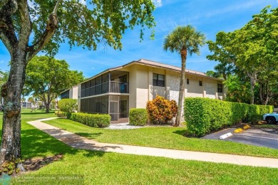 Spacious 2 bedroom, 2 bath condo well located in Deer Creek on Deer Creek Golf Club in Florida - for sale on GolfHomes.com, golf home, golf lot
