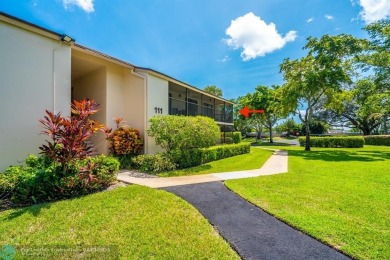 Spacious 2 bedroom, 2 bath condo well located in Deer Creek on Deer Creek Golf Club in Florida - for sale on GolfHomes.com, golf home, golf lot