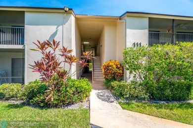 Spacious 2 bedroom, 2 bath condo well located in Deer Creek on Deer Creek Golf Club in Florida - for sale on GolfHomes.com, golf home, golf lot