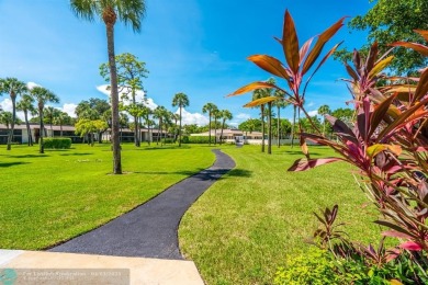 Spacious 2 bedroom, 2 bath condo well located in Deer Creek on Deer Creek Golf Club in Florida - for sale on GolfHomes.com, golf home, golf lot