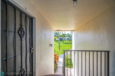 Spacious 2 bedroom, 2 bath condo well located in Deer Creek on Deer Creek Golf Club in Florida - for sale on GolfHomes.com, golf home, golf lot