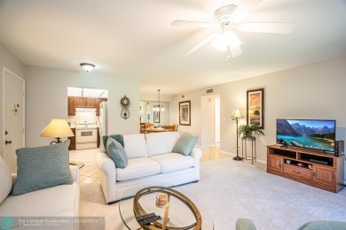 Spacious 2 bedroom, 2 bath condo well located in Deer Creek on Deer Creek Golf Club in Florida - for sale on GolfHomes.com, golf home, golf lot