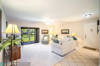 Spacious 2 bedroom, 2 bath condo well located in Deer Creek on Deer Creek Golf Club in Florida - for sale on GolfHomes.com, golf home, golf lot