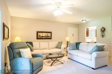 Spacious 2 bedroom, 2 bath condo well located in Deer Creek on Deer Creek Golf Club in Florida - for sale on GolfHomes.com, golf home, golf lot
