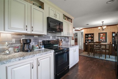 3 BED/2 BATH HOME BUILT in 2019 OVERLOOKING GOLF COURSE in GATED on Zellwood Station Country Club in Florida - for sale on GolfHomes.com, golf home, golf lot