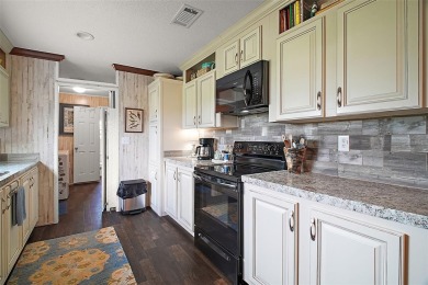 3 BED/2 BATH HOME BUILT in 2019 OVERLOOKING GOLF COURSE in GATED on Zellwood Station Country Club in Florida - for sale on GolfHomes.com, golf home, golf lot