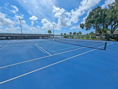 Welcome to this beautifully maintained 2/2 home where you will on Lake Henry Golf Club in Florida - for sale on GolfHomes.com, golf home, golf lot