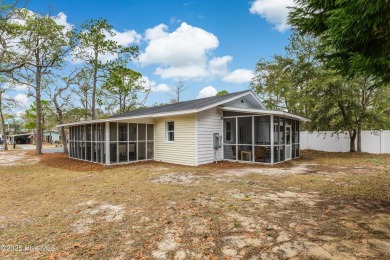 DOUBLE your pleasure with this fully renovated home on 2 LOTS, 2 on Founders Club At St. James Plantation in North Carolina - for sale on GolfHomes.com, golf home, golf lot