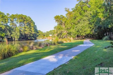 Tucked away on a peaceful street and adjacent to a tranquil on The Landings Club - Marshwood in Georgia - for sale on GolfHomes.com, golf home, golf lot