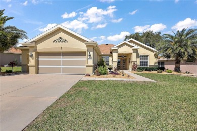 PRICE TO SELL!  Hanover Model - Block & Stucco - 3 Bedrooms - 2 on Eagle Ridge At Spruce Creek Country Club in Florida - for sale on GolfHomes.com, golf home, golf lot