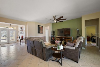 PRICE TO SELL!  Hanover Model - Block & Stucco - 3 Bedrooms - 2 on Eagle Ridge At Spruce Creek Country Club in Florida - for sale on GolfHomes.com, golf home, golf lot