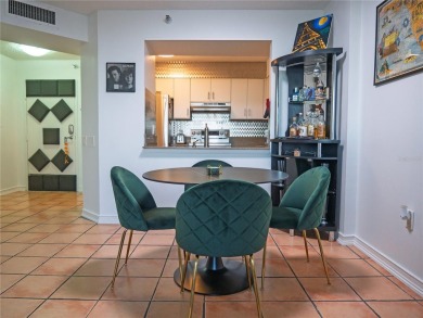 Welcome to Crystal Bay, where a bright and updated condo waits on Feather Sound Country Club in Florida - for sale on GolfHomes.com, golf home, golf lot