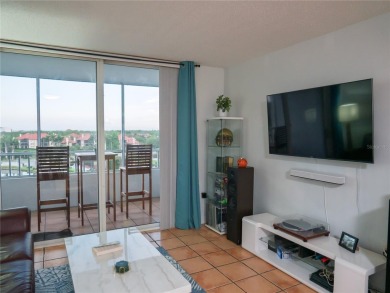 Welcome to Crystal Bay, where a bright and updated condo waits on Feather Sound Country Club in Florida - for sale on GolfHomes.com, golf home, golf lot