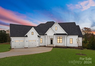 This exquisite new construction home, set on over half an acre on Deer Brook Golf Club in North Carolina - for sale on GolfHomes.com, golf home, golf lot