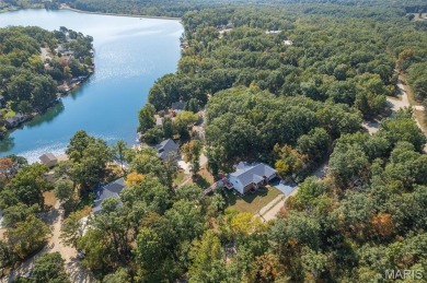 Vacation Living Every Day! Looking for the perfect second home on Terre Du Lac Golf and Country Club in Missouri - for sale on GolfHomes.com, golf home, golf lot
