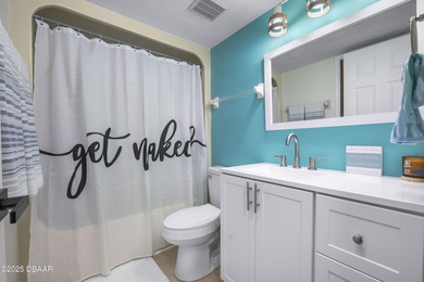 Listed below appraised value, this beautifully updated 3-bedroom on The Club At Pelican Bay - South Course in Florida - for sale on GolfHomes.com, golf home, golf lot