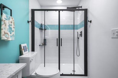 Listed below appraised value, this beautifully updated 3-bedroom on The Club At Pelican Bay - South Course in Florida - for sale on GolfHomes.com, golf home, golf lot