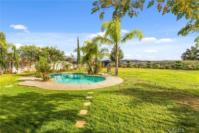 This two-story home is located on one of the largest lots along on Morongo Golf Club at Tukwet Canyon in California - for sale on GolfHomes.com, golf home, golf lot