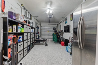 Affordable and stylishly renovated waterfront townhouse in the on Woodmont Country Club in Florida - for sale on GolfHomes.com, golf home, golf lot