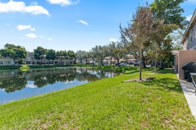 Affordable and stylishly renovated waterfront townhouse in the on Woodmont Country Club in Florida - for sale on GolfHomes.com, golf home, golf lot