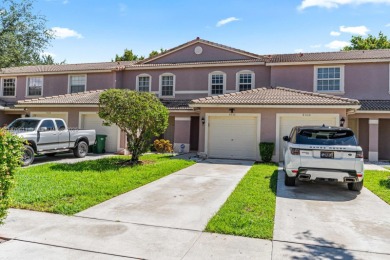 Affordable and stylishly renovated waterfront townhouse in the on Woodmont Country Club in Florida - for sale on GolfHomes.com, golf home, golf lot
