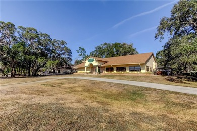 IF YOU ARE LOOKIG FOR AMAZING, WE'VE GOT IT! This move in ready on Meadow Oaks Golf and Country Club in Florida - for sale on GolfHomes.com, golf home, golf lot