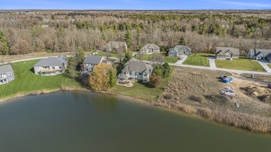 Discover the pinnacle of elegance and tranquility with this on Tullymore Golf Club in Michigan - for sale on GolfHomes.com, golf home, golf lot