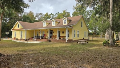4BR/3BA CUSTOM HOME ON 1 ACRE | BUCK BAY SUBDIVISION. Just on Chiefland Golf and Country Club in Florida - for sale on GolfHomes.com, golf home, golf lot