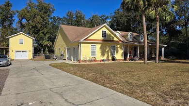 4BR/3BA CUSTOM HOME ON 1 ACRE | BUCK BAY SUBDIVISION. Just on Chiefland Golf and Country Club in Florida - for sale on GolfHomes.com, golf home, golf lot