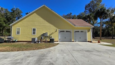 4BR/3BA CUSTOM HOME ON 1 ACRE | BUCK BAY SUBDIVISION. Just on Chiefland Golf and Country Club in Florida - for sale on GolfHomes.com, golf home, golf lot