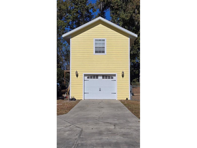 4BR/3BA CUSTOM HOME ON 1 ACRE | BUCK BAY SUBDIVISION. Just on Chiefland Golf and Country Club in Florida - for sale on GolfHomes.com, golf home, golf lot