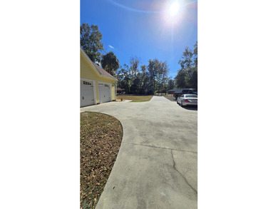 4BR/3BA CUSTOM HOME ON 1 ACRE | BUCK BAY SUBDIVISION. Just on Chiefland Golf and Country Club in Florida - for sale on GolfHomes.com, golf home, golf lot
