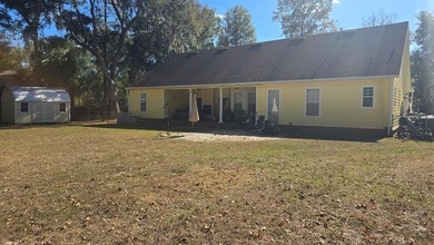 4BR/3BA CUSTOM HOME ON 1 ACRE | BUCK BAY SUBDIVISION. Just on Chiefland Golf and Country Club in Florida - for sale on GolfHomes.com, golf home, golf lot