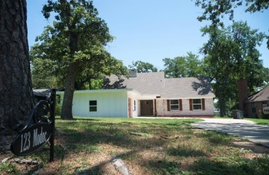 Come see this rare find in Lake Kiowa located right on the first on Lake Kiowa Golf Course in Texas - for sale on GolfHomes.com, golf home, golf lot