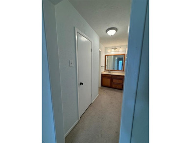 Welcome to 816 Pebbles Beach Drive Townhome! The backyard is on Mesquite Municipal Golf Course in Texas - for sale on GolfHomes.com, golf home, golf lot