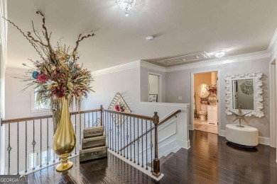Discover this beautifully designed 4-sided brick home tucked on Crystal Lake Golf and Country Club in Georgia - for sale on GolfHomes.com, golf home, golf lot