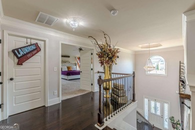 Discover this beautifully designed 4-sided brick home tucked on Crystal Lake Golf and Country Club in Georgia - for sale on GolfHomes.com, golf home, golf lot