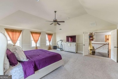 Discover this beautifully designed 4-sided brick home tucked on Crystal Lake Golf and Country Club in Georgia - for sale on GolfHomes.com, golf home, golf lot