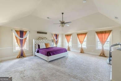 Discover this beautifully designed 4-sided brick home tucked on Crystal Lake Golf and Country Club in Georgia - for sale on GolfHomes.com, golf home, golf lot