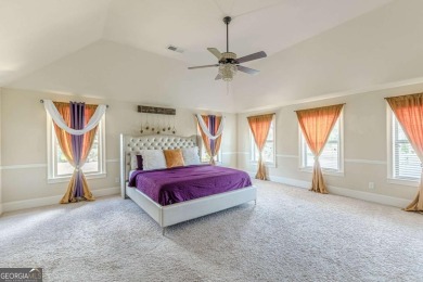 Discover this beautifully designed 4-sided brick home tucked on Crystal Lake Golf and Country Club in Georgia - for sale on GolfHomes.com, golf home, golf lot