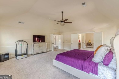 Discover this beautifully designed 4-sided brick home tucked on Crystal Lake Golf and Country Club in Georgia - for sale on GolfHomes.com, golf home, golf lot