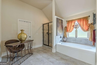 Discover this beautifully designed 4-sided brick home tucked on Crystal Lake Golf and Country Club in Georgia - for sale on GolfHomes.com, golf home, golf lot