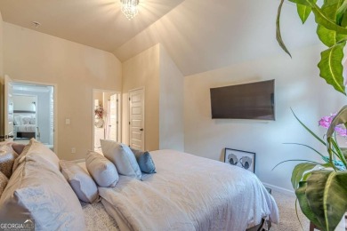 Discover this beautifully designed 4-sided brick home tucked on Crystal Lake Golf and Country Club in Georgia - for sale on GolfHomes.com, golf home, golf lot